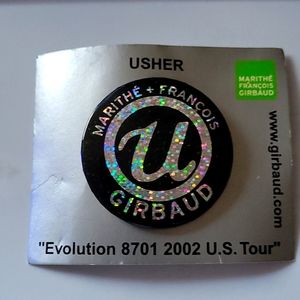 "USHER Evolution 8701 2002 US TOUR" button.